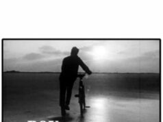 Puisis un velosipēds Boy and Bicycle